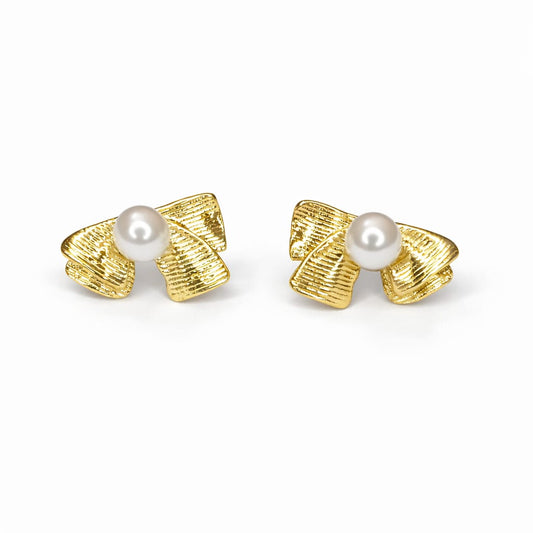 Pair of gold textured ribbon bow pearl earrings - delicate stud earrings with secure push-back closure